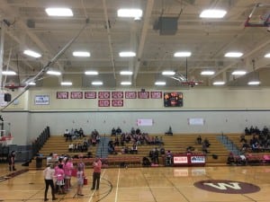 WHS Athletic Director John Brown was pretty in pink while handling raffle duties