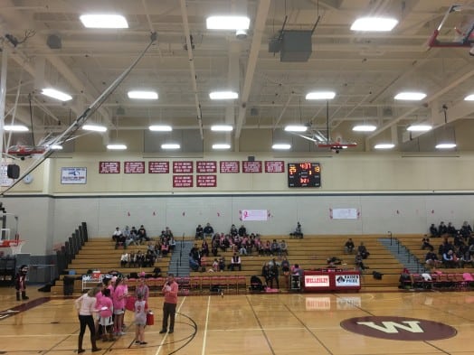 WHS Athletic Director John Brown was pretty in pink while handling raffle duties