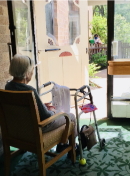 elizabeth seton resident listens to music