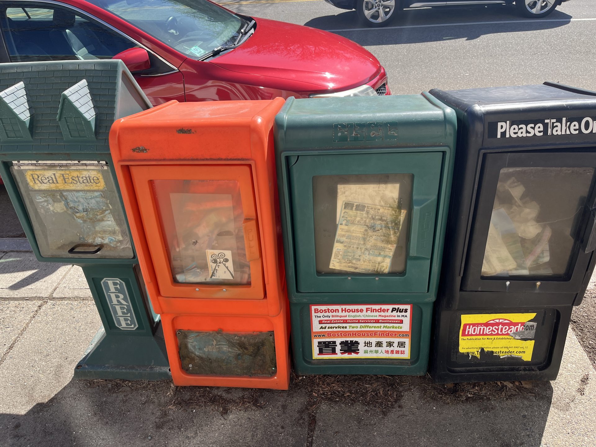 news boxes in front of jejes