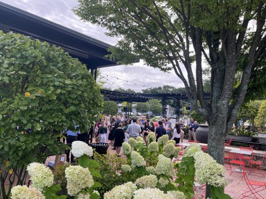 Charles River Regional Chamber coffee gathering at Linden Square courtyard