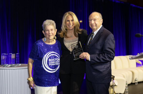 Dr. Riseberg and the Smiths at awards ceremony