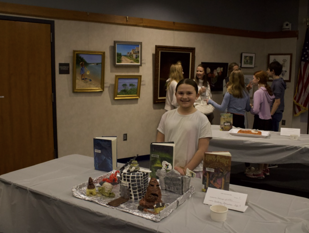 Luciana Gonzalez next to her Harry Potter themed edible creation.