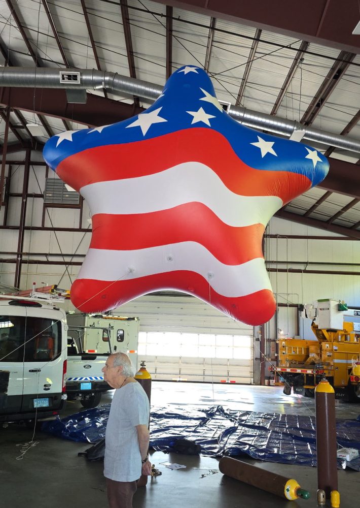 Get a sense of the balloon's size overhead of Tony Cavallerano, a volunteer who helped inflate it