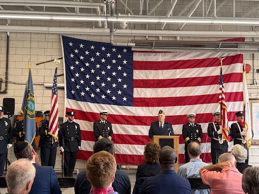 Retired Marine veteran Pete Jones speaks during Wellesley’s 25th anniversary Sept. 11 remembrance ceremony Friday at the Wellesley Fire Department. 